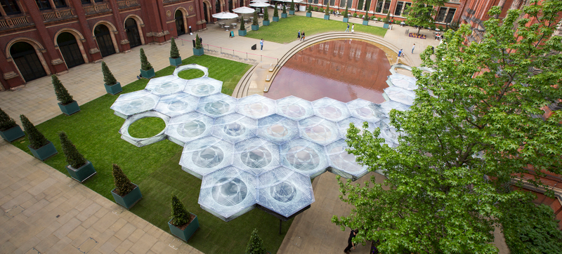 Illustration for article titled This Amazing Carbon Fiber Pavilion Was Woven by a Robot
